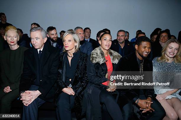 Tilda Swinton, Owner of LVMH Luxury Group Bernard Arnault, his wife Helene Arnault, Usher, his wife Grace Miguel and Natalia Vodianova attend the...