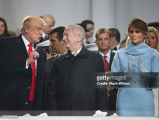 President Donald Trump , talks with Secretary of Defense nominee Gen. James Mattis Ret. , while first lady Melania Trump stands nearby inside of the...