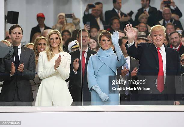 President Donald Trump , stands with his wife first lady Melania Trump, daughter Ivanka Trump and her husband Jared Kushner, inside of the inaugural...