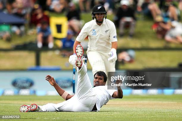 Rubel Hossain of Bangladesh fields the ball from his bowling during day two of the Second Test match between New Zealand and Bangladesh at Hagley...