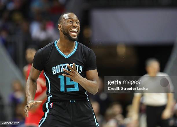 Kemba Walker of the Charlotte Hornets reacts after making a basket against the Toronto Raptors during their game at Spectrum Center on January 20,...