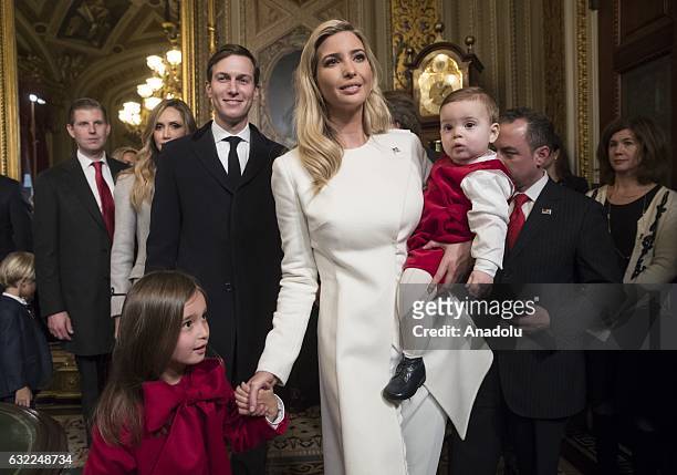 Ivanka Trump, with her husband Jared Kushner and their children, depart after her father President Donald Trump formally signed his cabinet...