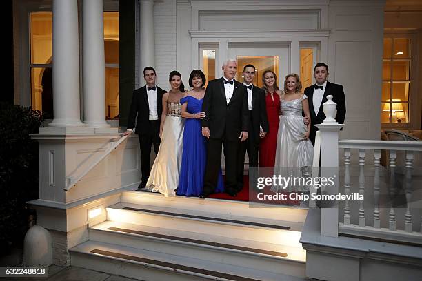 Vice President Mike Pence , his wife Karen Pence, their daughters Audrey and Charlotte and their son Michael and his wife Sarah pose for photographs...