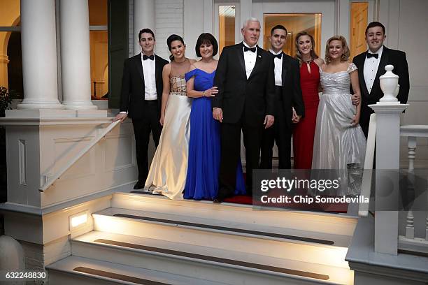 Vice President Mike Pence , his wife Karen Pence, their daughters Audrey and Charlotte and their son Michael and his wife Sarah pose for photographs...