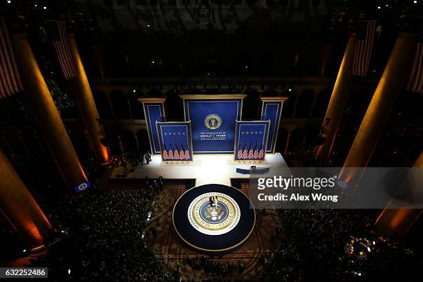 President Donald Trump and his wife First Lady Melania Trump prepare to dance during A Salute To Our Armed Services Inaugural Ball at the National...
