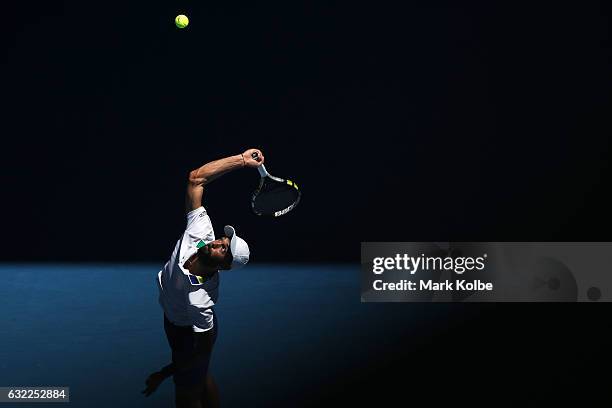 Benoit Paire of France serves in his third round match against Dominic Thiem of Austria on day six of the 2017 Australian Open at Melbourne Park on...