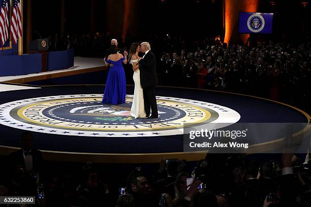 President Donald Trump, his wife First Lady Melania Trump, Vice President Mike Pence and Karen Pence dance during A Salute To Our Armed Services...