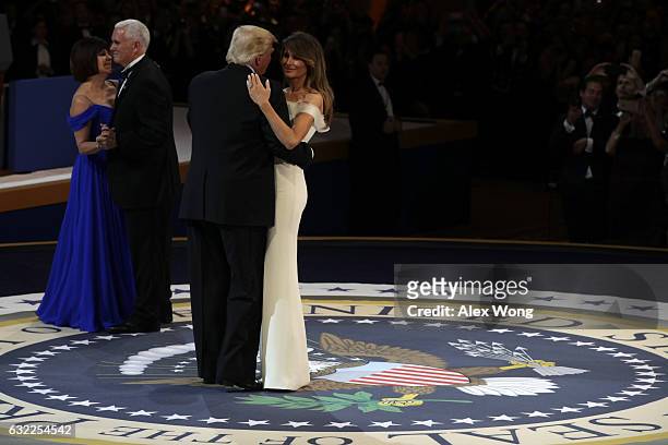 President Donald Trump, his wife First Lady Melania Trump, Vice President Mike Pence and Karen Pence dance during A Salute To Our Armed Services...