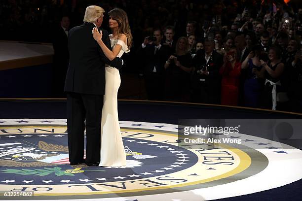 President Donald Trump and his wife First Lady Melania Trump dance during A Salute To Our Armed Services Inaugural Ball at the National Building...