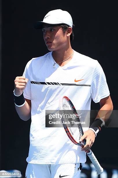 Yibing Wu of China looks on in his first round match against Yuta Kikuchi of Japan during the Australian Open 2017 Junior Championships at Melbourne...