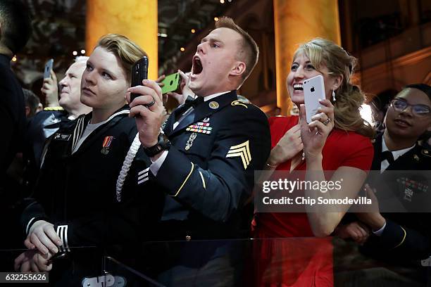 Members of the U.S. Military cheer for U.S. President Donald Trump during the Armed Forces Ball at the National Building Museum January 20, 2017 in...