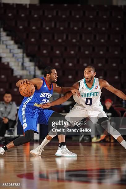 Dionte Christmas of the Delaware 87ers handles the ball against Rasheed Sulaimon of the Greensboro Swarm as part of 2017 NBA D-League Showcase at the...