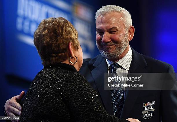 Dale Jarrett embraces Terri Parsons, widow of Benny Parsons, after presenting her with Benny's Hall of Fame Ring at the NASCAR Hall of Fame on...