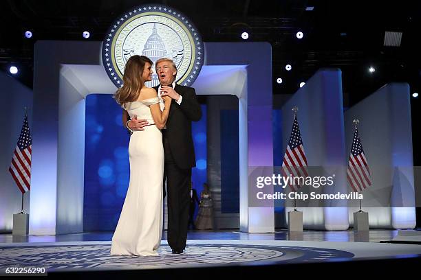 President Donald Trump and first lady Melania Trump dance during the Freedom Ball at the Washington Convention Center January 20, 2017 in Washington,...