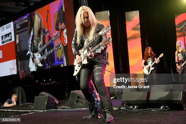 Guitarist Lita Ford performs on stage at the She Rocks Awards during the 2017 NAMM Show at the Anaheim Convention Center on January 20, 2017 in...