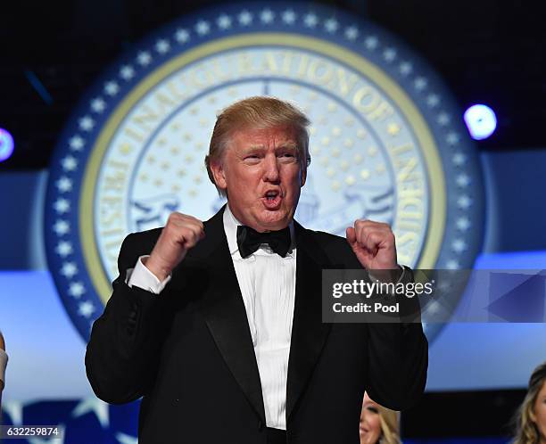 President Donald Trump and First Lady Melania Trump dance at the Freedom Ball on January 20, 2017 in Washington, D.C. Trump will attend a series of...