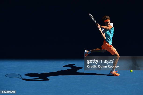 Alexander Zverev of Germany plays a backhand in his third round match against Rafael Nadal of Spain on day six of the 2017 Australian Open at...