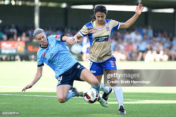 Jennifer Hoy of the Jets is tackled by Alanna Kennedy of Sydney during the round 13 W-League match between Sydney FC and the Newcastle Jets at...