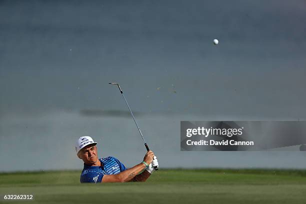 Rickie fowler of the United States plays his second shot on the fourth hole during the third round of the 2017 Abu Dhabi HSBC Golf Championship at...