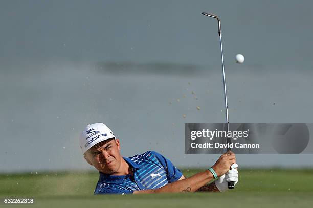 Rickie fowler of the United States plays his second shot on the fourth hole during the third round of the 2017 Abu Dhabi HSBC Golf Championship at...