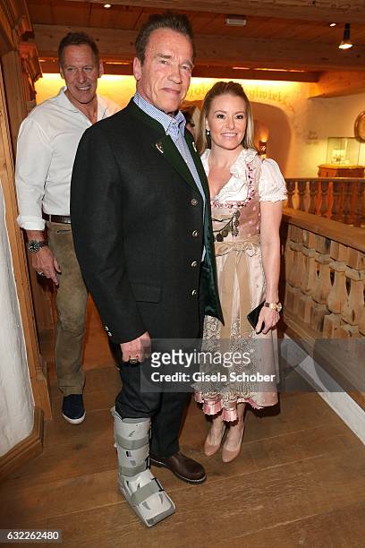 Arnold Schwarzenegger and his girlfriend Heather Milligan during the Weisswurstparty at Hotel Stanglwirt on January 20, 2017 in Going near...