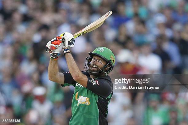 Rob Quiney of the Melbourne Stars hits a 6 during the Big Bash League match between the Melbourne Stars and the Sydney Sixers at Melbourne Cricket...