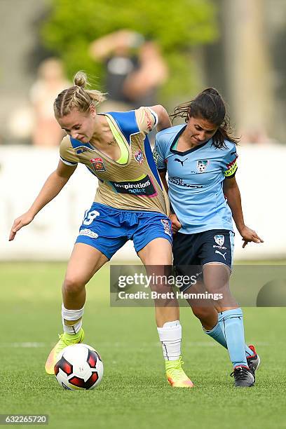 Ashlee Brodigan of the Jets and Teresa Polias of Sydney contest the ball during the round 13 W-League match between Sydney FC and the Newcastle Jets...