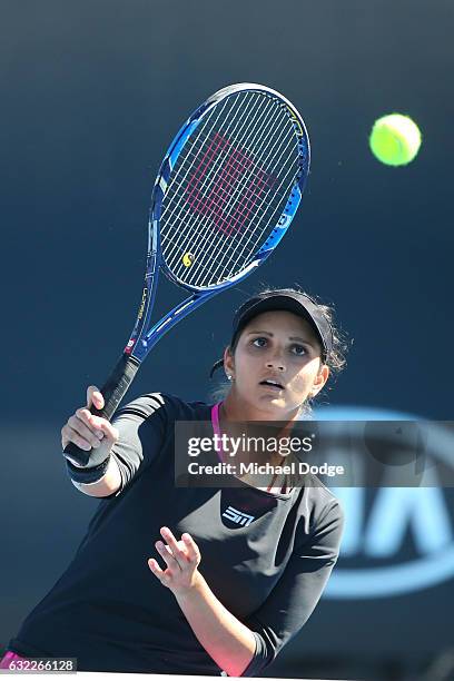 Laura Siegemund of Germany competes in her first round match with Mate Pavic of Croatia against Sania Mirza of India and Ivan Dodig of Croatia on day...