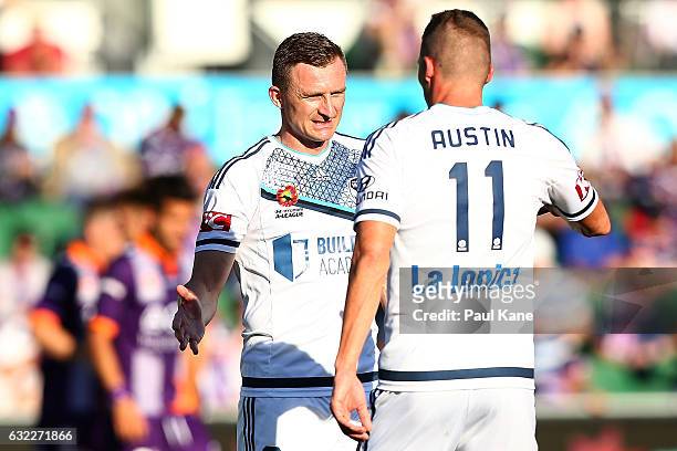 Besart Berisha of the Victory is acknowledged by Mitch Austin while walking from the field following a missed penalty shot during the round 16...