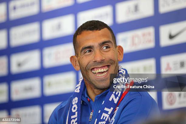 Argentine striker Carlos Tevez attends his first presser after joining Shanghai Shenhua, on January 21, 2017 in Shanghai, China. The Argentine...