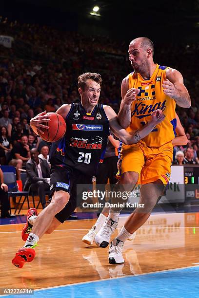 Nathan Sobey of the Adelaide 36ers drives to the basket as Aleks Maric of the Sydney Kings defends during the round 16 NBL match between the Adelaide...