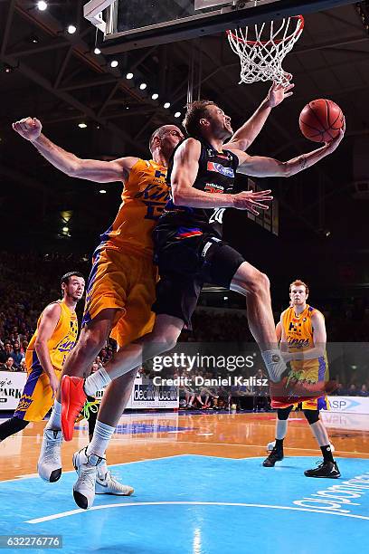 Nathan Sobey of the Adelaide 36ers drives to the basket as Aleks Maric of the Sydney Kings defends during the round 16 NBL match between the Adelaide...