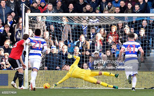 Alex Smithies of Queens Park Rangers saves Chris Martin of Fulham FC penalty during the Sky Bet Championship match between Queens Park Rangers and...