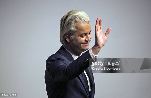 Geert Wilders, leader of the Dutch Freedom Party, waves to the audience ahead of speaking during a Europe of Nations and Freedom meeting in Koblenz,...
