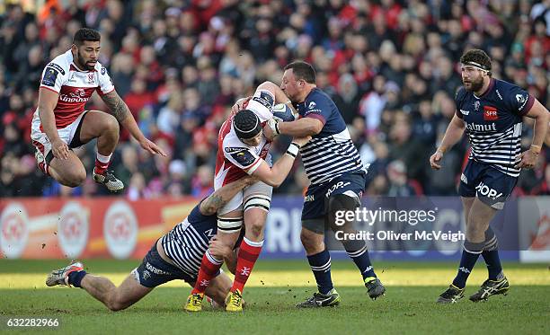 Belfast , Ireland - 21 January 2017; Kieran Treadwell of Ulster tackled by Marco Tauleigne, left, and Marc Clerc of Bordeaux-Begles during the...