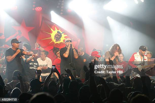 Tim Commerford, Brad Wilk, Chuck D, B-Real, Chris Cornell, Jack Black, Kyle Gass, and Tom Morello perform during the Prophets Of Rage And Friends'...