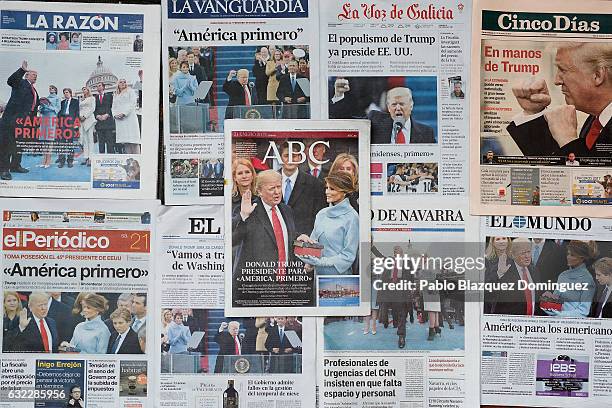 An arrangement of Spanish newspapers show U.S. President Donald Trump on the front pages the day after his inauguration on January 21, 2017 in...