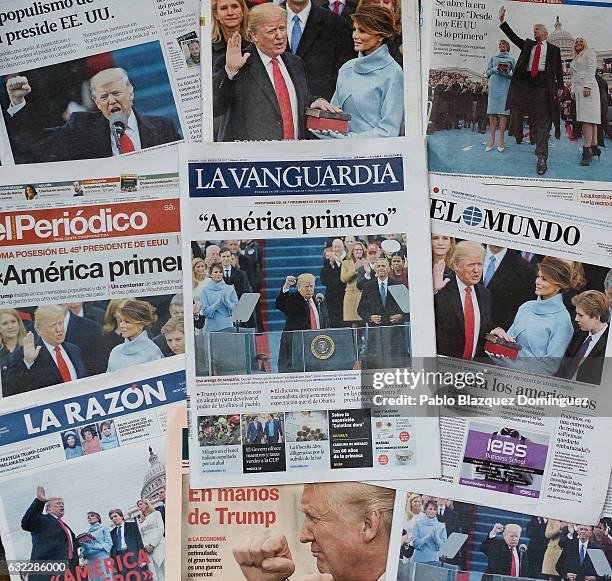 An arrangement of Spanish newspapers show U.S. President Donald Trump on the front pages the day after his inauguration on January 21, 2017 in...