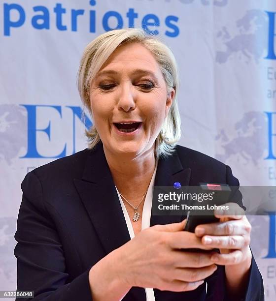 Marine Le Pen smiles at a conference of European right-wing parties on January 21, 2017 in Koblenz, Germany. In an event hosted by the Europe of...