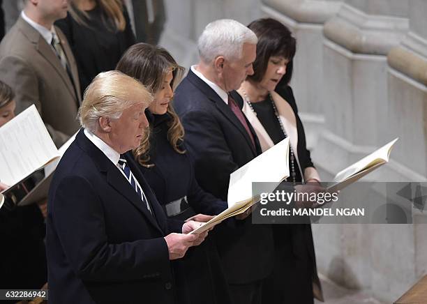 President Donald Trump, First Lady Melania Trump, Vice President Mike Pence and Karen Pence attend the National Prayer Service at the National...