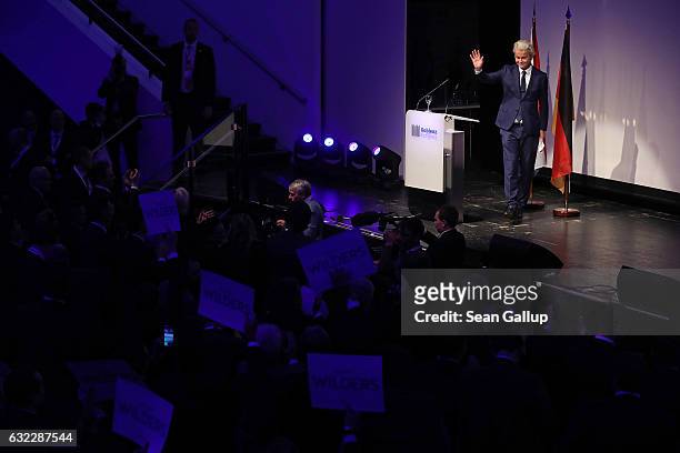 Geert Wilders, leader of the Dutch PVV political party, greets supporters after speaking at a conference of European right-wing parties on January...