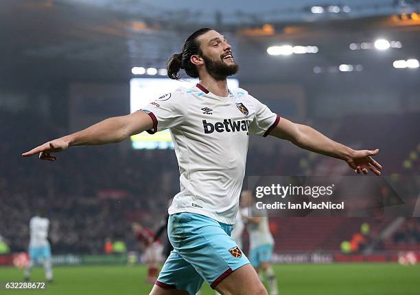 Andy Carroll of West Ham United celebrates scoring his sides second goal during the Premier League match between Middlesbrough and West Ham United at...