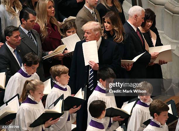 President Donald Trump attends the National Prayer Services with his wife first lady Melania Trump, Vice President Mike Pence, and his wife Karen...