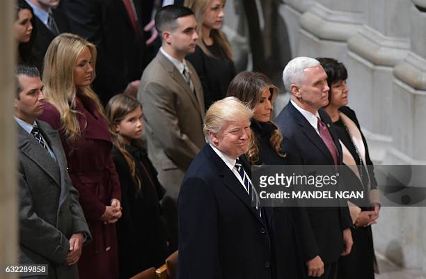 President Donald Trump, wife Melania; Vice President Mike Pence, and wife Karen attend the National Prayer Service at the National Cathedral on...