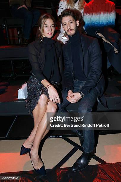 Pierre Niney and Natasha Andrews attend the Dior Homme Menswear Fall/Winter 2017-2018 show as part of Paris Fashion Week on January 21, 2017 in...