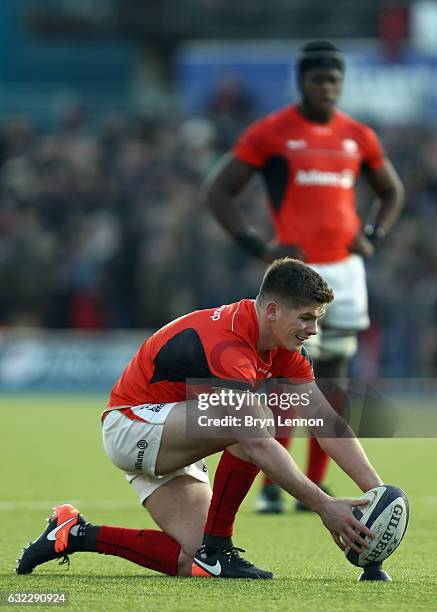 Owen Farrell of Saracens prepares to take a penalty kick during the European Rugby Champions Cup match between Saracens and RC Toulon on January 21,...