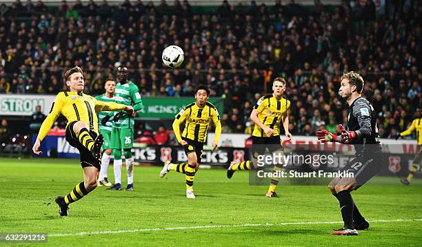 Lukasz Piszczek of Dortmund scores the second goal during the Bundesliga match between Werder Bremen and Borussia Dortmund at Weserstadion on January...