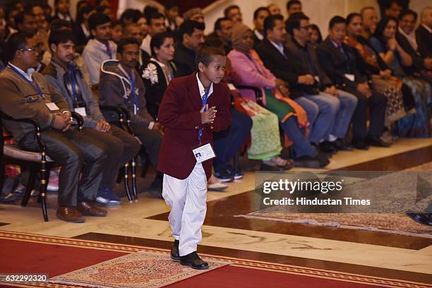 President Pranab Mukherjee presenting the National Awards for Bravery to Mohan Sethy at Rastrapati Bhawan, on January 21, 2017 in New Delhi, India....