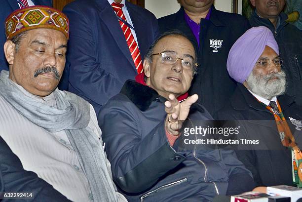 Union Finance Minister Arun Jaitley with BJP State President Vijay Sampla and Lok Sabha by-poll candidate Rajinder Mohan Singh Chhina during his...