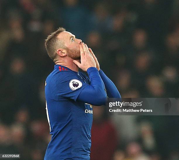 Wayne Rooney of Manchester United celebrates scoring their first goal and becoming the club's record goalscorer with 250 goals during the Premier...